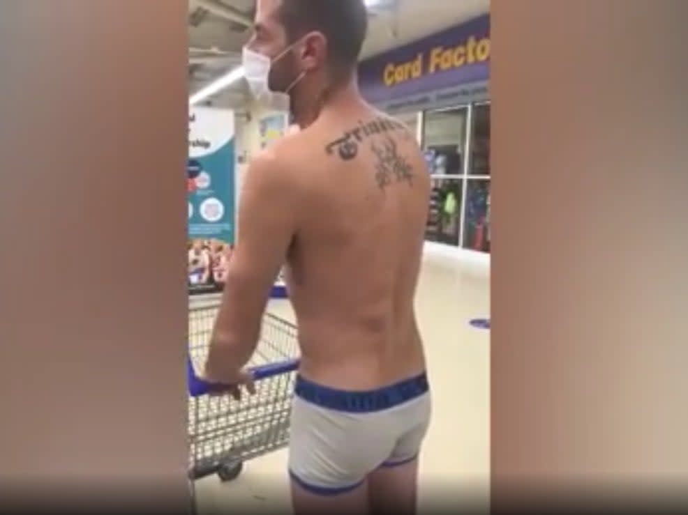 Chris Noden, 38, tried to enter a Tesco supermarket in Wales dressed in his underpants and a face mask in protest of the Welsh Government’s ban on the sale of  ‘non-essential’ items in supermarkets (Wales News Service)