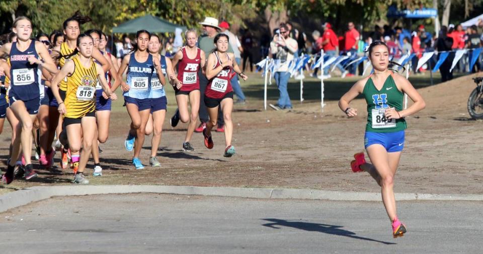 Highland High senior Mía Torrecillas won her third section title after claiming the Division II race in 18:10.42 at the CIF Central Section cross country championships at Woodward Park on Nov. 16, 2023.