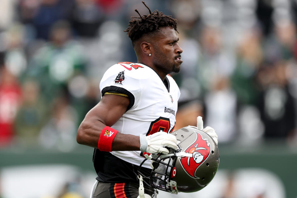 Antonio Brown in a Buccaneers jersey on football field