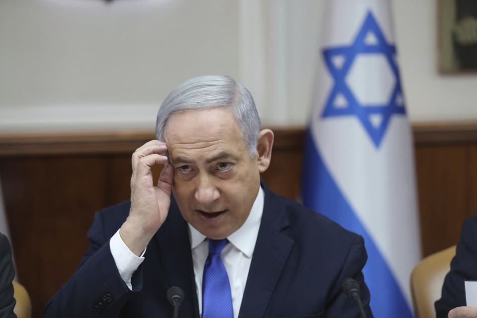 Israeli Prime Minister Benjamin Netanyahu attends the weekly cabinet meeting at his office in Jerusalem, Israel, Sunday, Dec. 29, 2019. (Abir Sultan /Pool photo via AP)