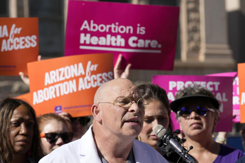 Dr. Paul Isaacson speaks as Arizona abortion-rights supporters gather for a news conference prior to delivering over 800,000 petition signatures to the capitol to get abortion rights on the November general election ballot Wednesday, July 3, 2024, in Phoenix. (AP Photo/Ross D. Franklin)