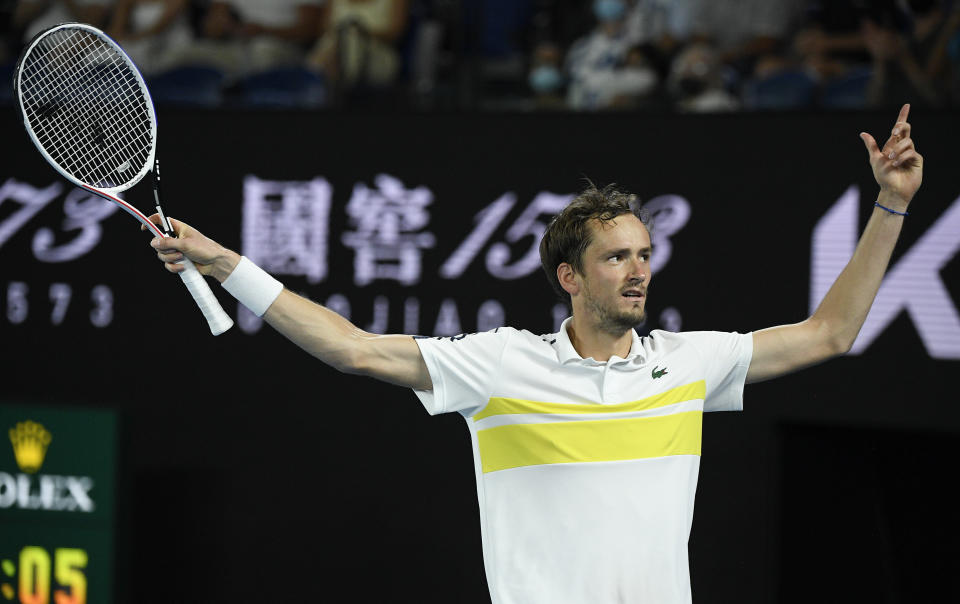 Russia's Daniil Medvedev reacts after winning a point against Greece's Stefanos Tsitsipas during their semifinal match at the Australian Open tennis championship in Melbourne, Australia, Friday, Feb. 19, 2021.(AP Photo/Andy Brownbill)