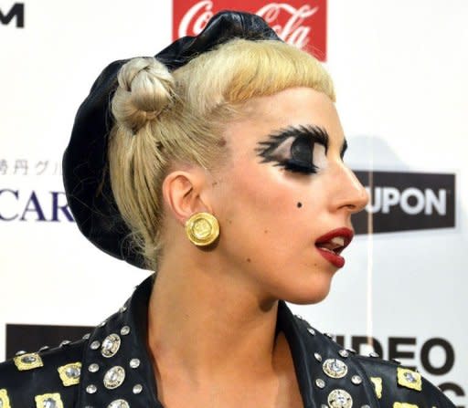 US singer Lady Gaga performs at a charity concert in Chiba City in suburban Tokyo in June 2011. Accused of contaminating youngsters with "satanic" dance moves and "intolerable" outfits, the cult of Lady Gaga is on a collision course with Asia's moral guardians ahead of her mammoth world tour