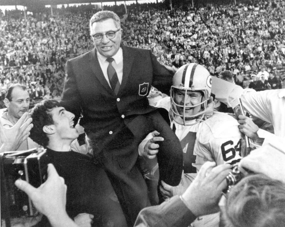 Green Bay Packers coach Vince Lombardi is carried off the field after Super Bowl 2.