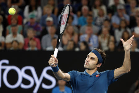 Tennis - Australian Open - Fourth Round - Melbourne Park, Melbourne, Australia, January 20, 2019. Switzerland’s Roger Federer in action during the match against Greece’s Stefanos Tsitsipas. REUTERS/Aly Song