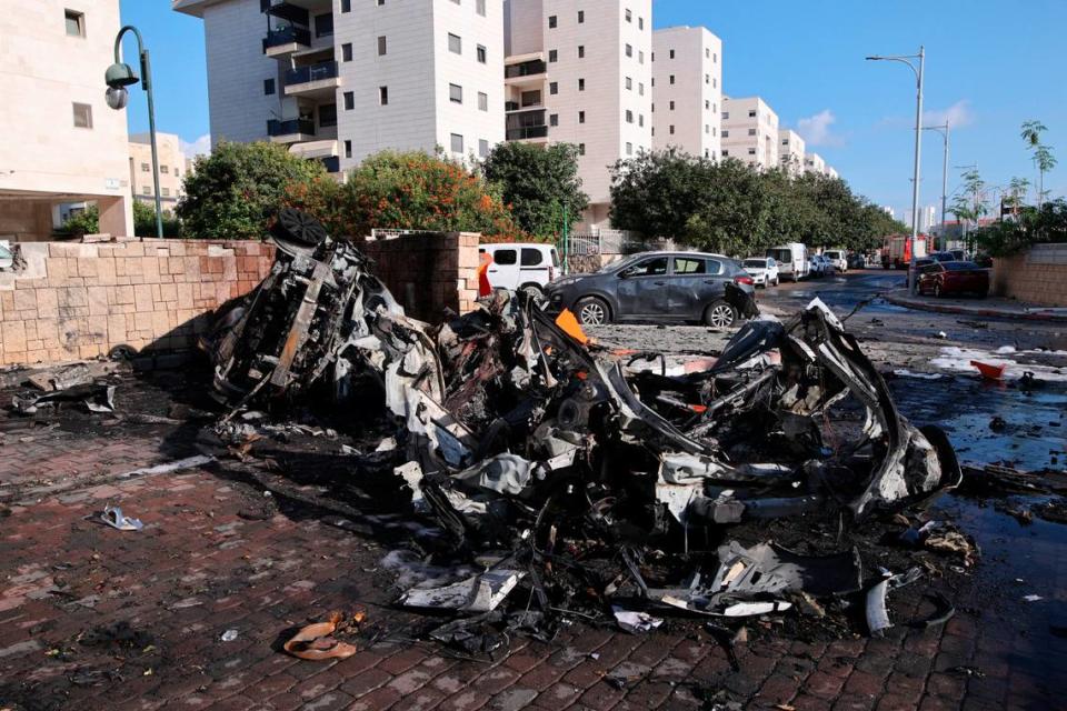 This photo taken on Oct. 7, 2023 shows vehicles damaged by rockets in Ashkelon, southern Israel. Over 40 Israelis have been killed and more than 700 injured in the Islamic Resistance Movement’s (Hamas) offensive that began earlier on Saturday, reported Israeli media citing Magen David Adom from emergency services. Ilan Assayag/Xinhua/Sipa USA