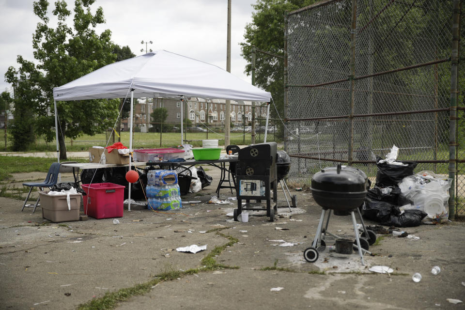 The aftermath of a shooting at a graduation party in Philadelphia, Monday, June 17, 2019. Authorities say at least one man has been killed and multiple other people were wounded in the shooting which occurred around 10 p.m. Sunday. (AP Photo/Matt Rourke)