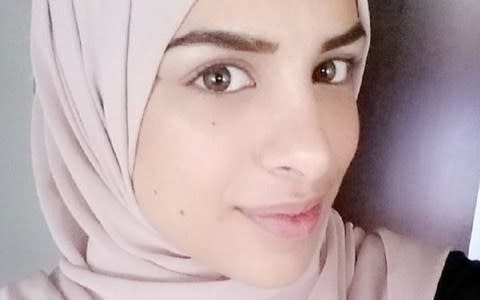 Farah Alhajeh, 24, was applying for a job as an interpreter when she declined to shake the hand of a male interviewer for religious reasons - Credit: BBC