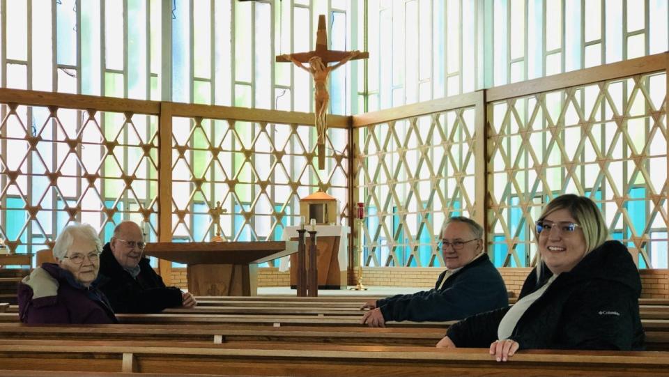 Adele and Patrick Demers, left, and Glenn Dowey and Director of Mission Ashley Buxton, all members of St. Therese of Lisieux Church in Sanford-Springvale, Maine, are seen here inside Notre Dame Church on Payne Street on Monday, Jan. 30, 2023. Parishioners will celebrate their final Mass at the church on Saturday, Feb. 11, 2023.