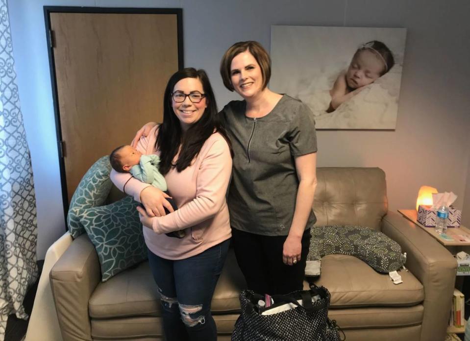 Sarah Perkins and her infant, Gavin, meet with Melanie Henstrom, a lactation consultant in Boise. Perkins said that, after the tongue-tie release, her baby breastfed immediately.