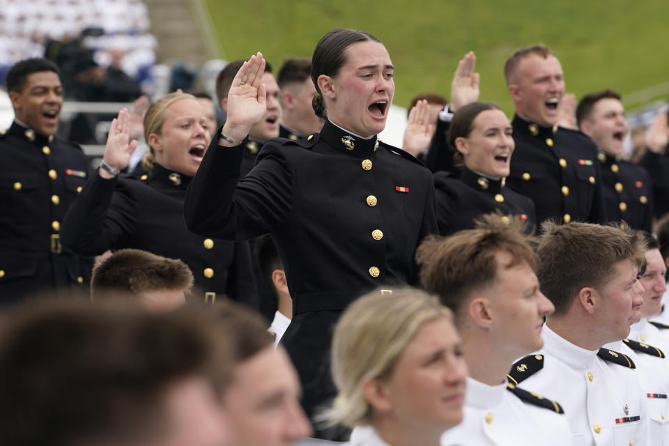Graduating Marines take their oath during the U.S. Naval Academy's graduation and commissioning ceremony at the Navy-Marine Corps Memorial Stadium in Annapolis, Md., Friday, May 27, 2022. (AP Photo/Susan Walsh)