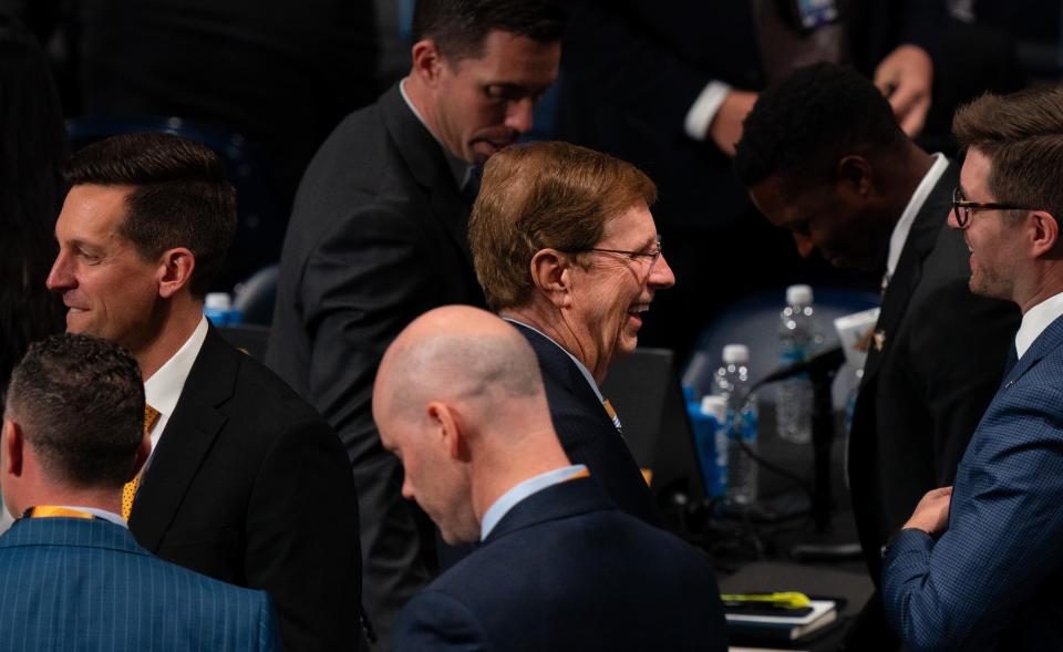 Outgoing Nashville Predators General Manager David Poile, center, has a chance to relax after the second day of the NHL Draft at Bridgestone Arena Thursday, June 29, 2023. The Predators manufactured a last-minute trade to get another pick in the late seventh round.