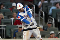Atlanta Braves' Austin Riley (27) breaks his bat as he grounds out in the third inning of a baseball game against the Philadelphia Phillies, Sunday, April 11, 2021, in Atlanta. (AP Photo/John Bazemore)