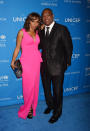 <p>The actress hit the red carpet in a bright pink dress from Black halo, a silver clutch and black sandals. Rodney Peete allowed his wife’s dress to shine, opting for a simple black suit.</p>