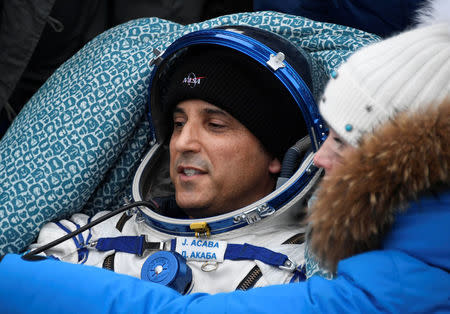 International Space Station crew member astronaut Joe Acaba of the U.S. rests after the Soyuz MS-06 capsule landed in a remote area outside the town of Dzhezkazgan (Zhezkazgan), Kazakhstan, February 28, 2018. REUTERS/Alexander Nemenov/Pool