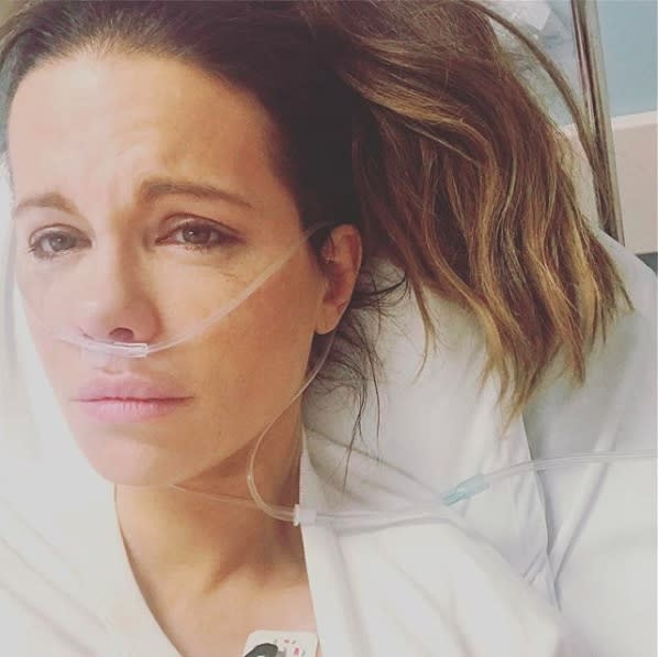 Kate Beckinsale took a selfie in her hospital bed and captioned it, "Turns out a ruptured ovarian cyst really hurts and morphine makes me cry. So thankful to everyone who looked after me #wobbly."