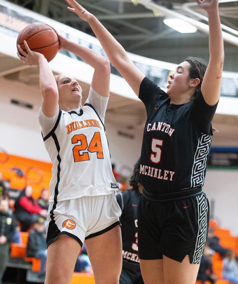 McKinley's Sidnee Bowden (5) defends Green's Jenna Slates during a girls high school basketball game at Green on Wednesday, Feb. 1, 2023.