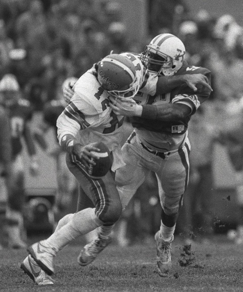 Kentucky defensive end Carwell Gardner sacked Florida quarterback Kerwin Bell during UK’s 10-3 victory over Florida on Nov. 15, 1986, at the venue then known as Commonwealth Stadium.