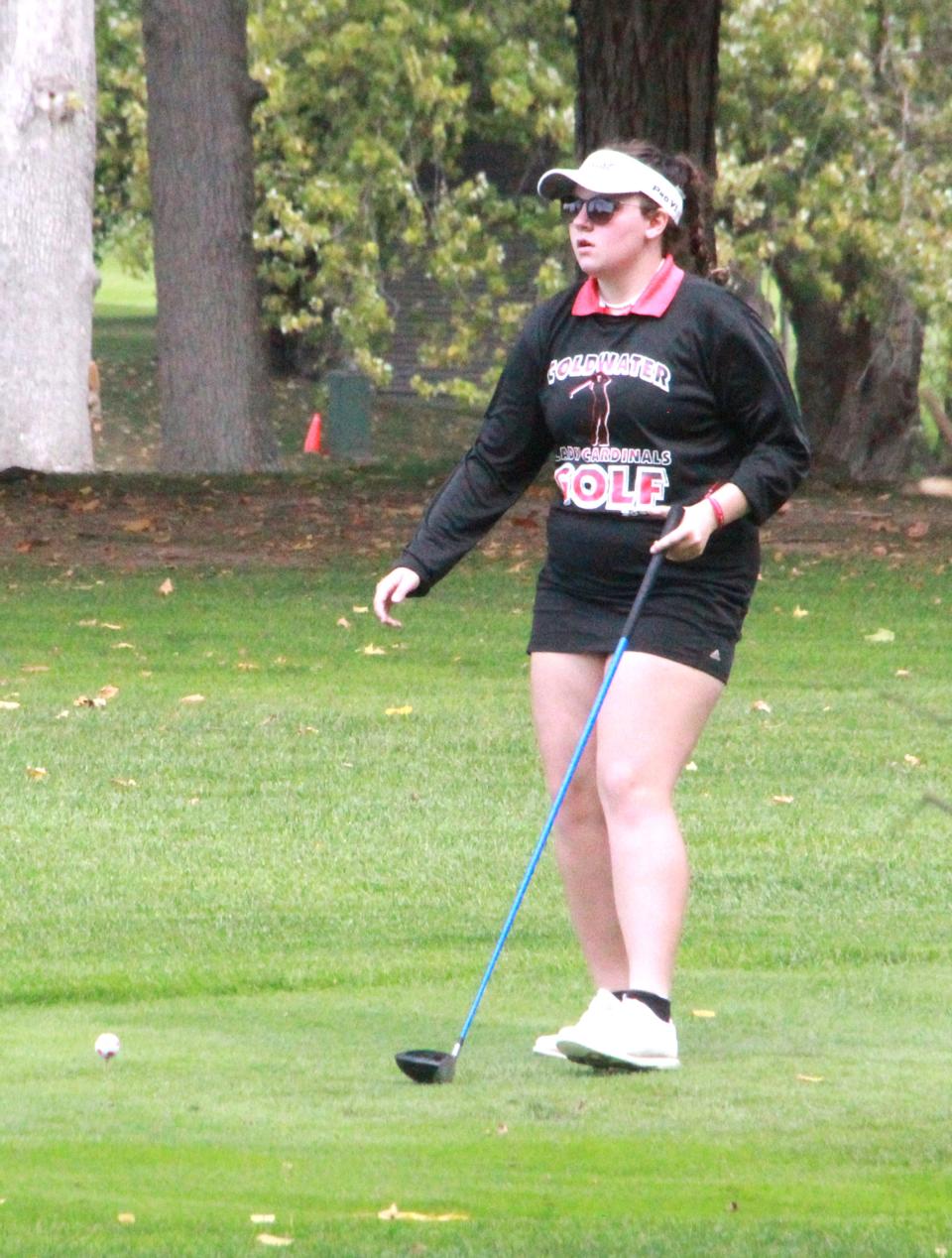 Coldwater's Violet Cunkle sizes up the fairway before her drive on the ninth hole Thursday during regional play.