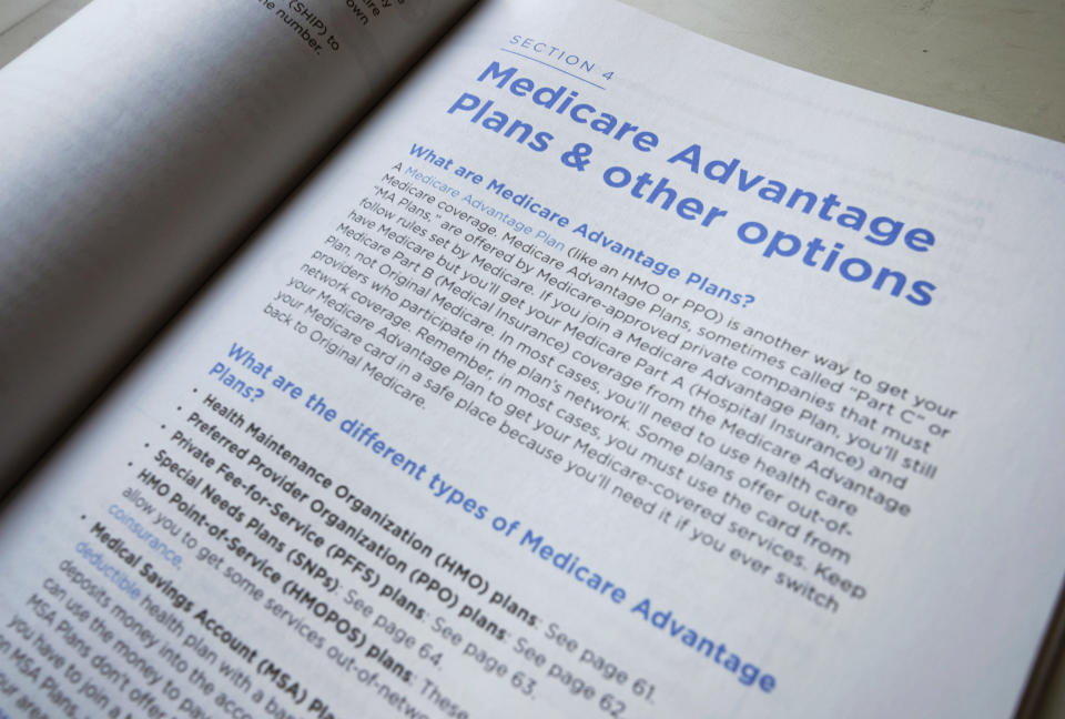 A page from the 2019 U.S. Medicare Handbook is photographed Thursday, Nov. 8, 2018, in Washington. Seniors in many states will be able to get additional services like help with chores, safety devices and respite for caregivers next year through private ‘Medicare Advantage’ insurance plans. It’s a sign of potentially big changes for Medicare.(AP Photo/Pablo Martinez Monsivais)