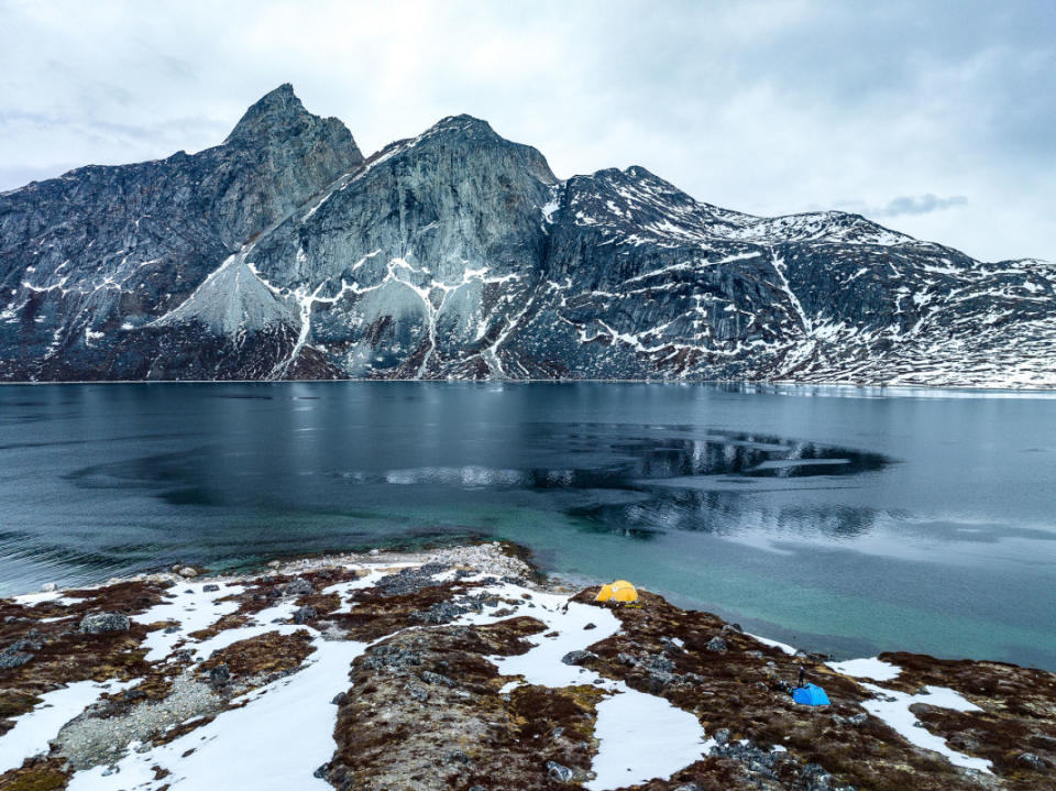 We camp in a fjord surrounded by majestic cliffs.<p>Photo: Aurelie Gonin</p>