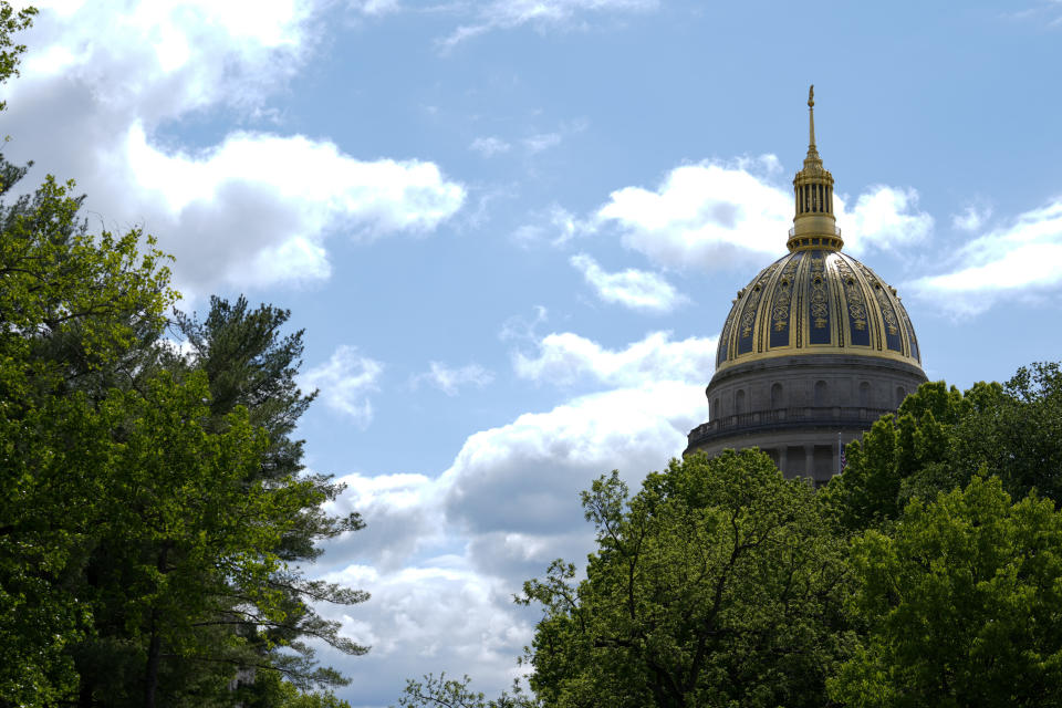 FILE - The West Virginia Capitol is seen, May 4, 2023, in Charleston, W.Va. West Virginia's Republican-controlled state House of Delegates voted overwhelmingly Wednesday, Feb. 21, 2024, to allow teachers and other school staff who undergo certain training to carry guns in K-12 school classrooms and campuses. (AP Photo/Jeff Dean, File)