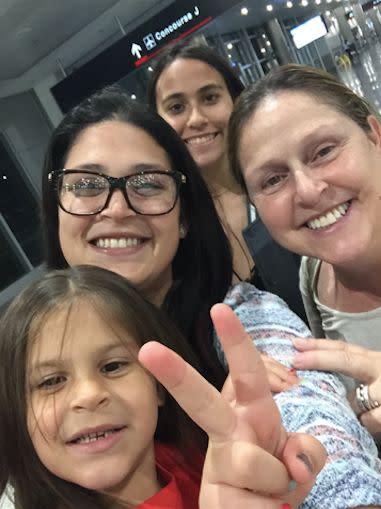 Deborah Drahus&nbsp;Capo (right) with (from bottom) her granddaughter, daughter and niece at the airport in San Juan, Puerto Rico. (Photo: Deborah Drahus Capo)