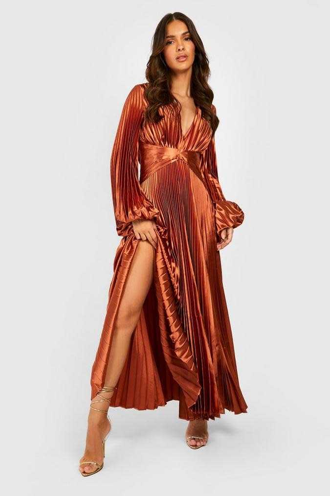 <p><a href="https://go.redirectingat.com?id=74968X1596630&url=https%3A%2F%2Fus.boohoo.com%2Fpleated-satin-oversized-sleeve-midaxi-dress-%2FGZZ18948.html&sref=https%3A%2F%2Fwww.cosmopolitan.com%2Fstyle-beauty%2Ffashion%2Fg19577819%2Fwhat-to-wear-bridal-shower%2F" rel="nofollow noopener" target="_blank" data-ylk="slk:Shop Now;elm:context_link;itc:0;sec:content-canvas" class="link ">Shop Now</a></p><p>Pleated Satin Oversized Sleeve Midi Dress</p><p>boohoo.com</p><p>$44.00</p>