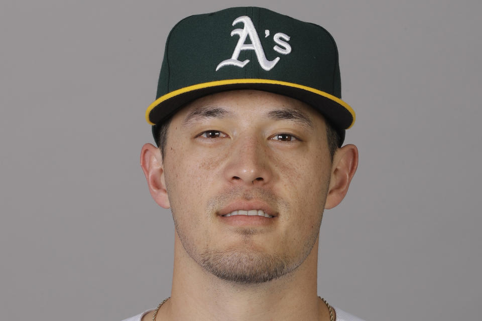 FILE - This is a 2020 file photo showing Collin Theroux of the Oakland Athletics baseball team. Following a year without a season due to the coronavirus pandemic, thousands of minor league players are finally returning to work. Many haven't played in a game since 2019, and players found creative ways to stay in shape and stay sharp. A’s catcher Collin Theroux focused on explosiveness. Among his workouts — venturing into the parking lot of his girlfriend's apartment complex and jumping on benches, electrical units or whatever else he could find. “Everybody was just embracing the weird at that point,” Theroux said. (AP Photo/Darron Cummings, File)