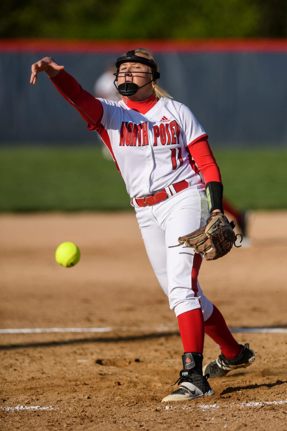 North Posey’s Erin Hoehn (11) pitches during the first inning against the Tecumseh Braves at Tecumseh High School in Lynnville, Ind., Wednesday, April 14, 2021. 