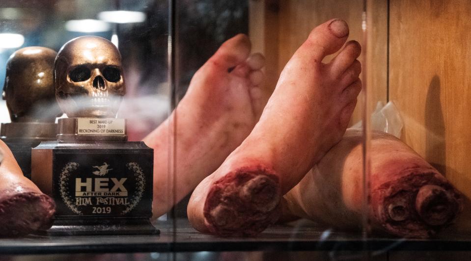 A foot used in a Woody Harrelson movie is displayed at Jonathan Thornton’s Southern Fried Monsters studio in Montgomery.