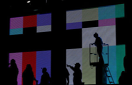 Stage workers are pictured during a media opportunity in preparations for the 24th Annual Screen Actors Guild Awards at Shrine Auditorium in Los Angeles, California, U.S., January 18, 2018. REUTERS/Mario Anzuoni