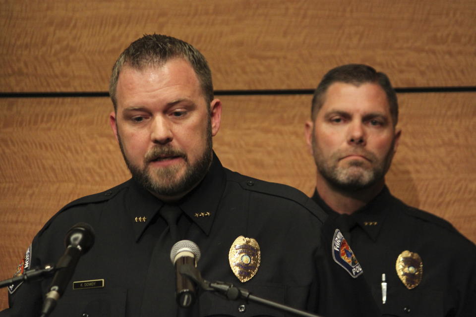 Farmington Deputy Police Chief Kyle Dowdy, left, and Deputy Chief Baric Crum provides details about a deadly shooting during a news conference in Farmington, N.M., on Tuesday, May 16, 2023. Authorities said the 18-year-old gunman killed three women and wounded six others while roaming a neighborhood and apparently firing at random targets. (AP Photo/Susan Montoya Bryan)