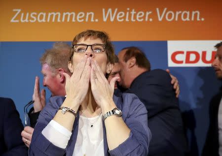 Annegret Kramp-Karrenbauer, State Minister-President and top candidate of the Christian Democratic Union Party (CDU) reacts after the Saarland state elections in Saarbruecken, Germany, March 26, 2017. REUTERS/Kai Pfaffenbach