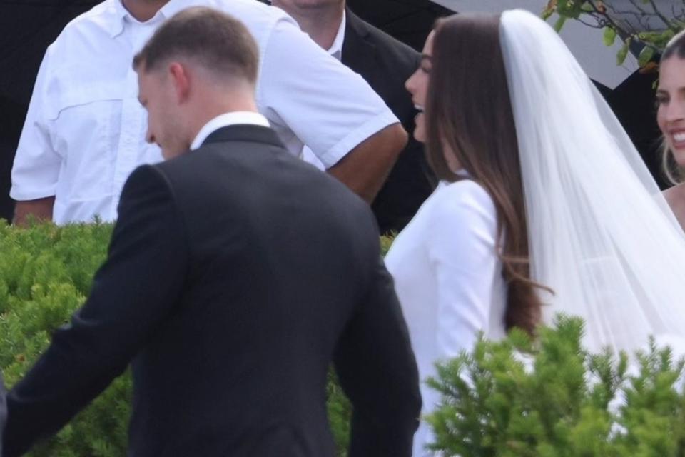 <p>Patriot Pics / BACKGRID</p> Christian McCaffrey and Olivia Culpo at their June 29 wedding