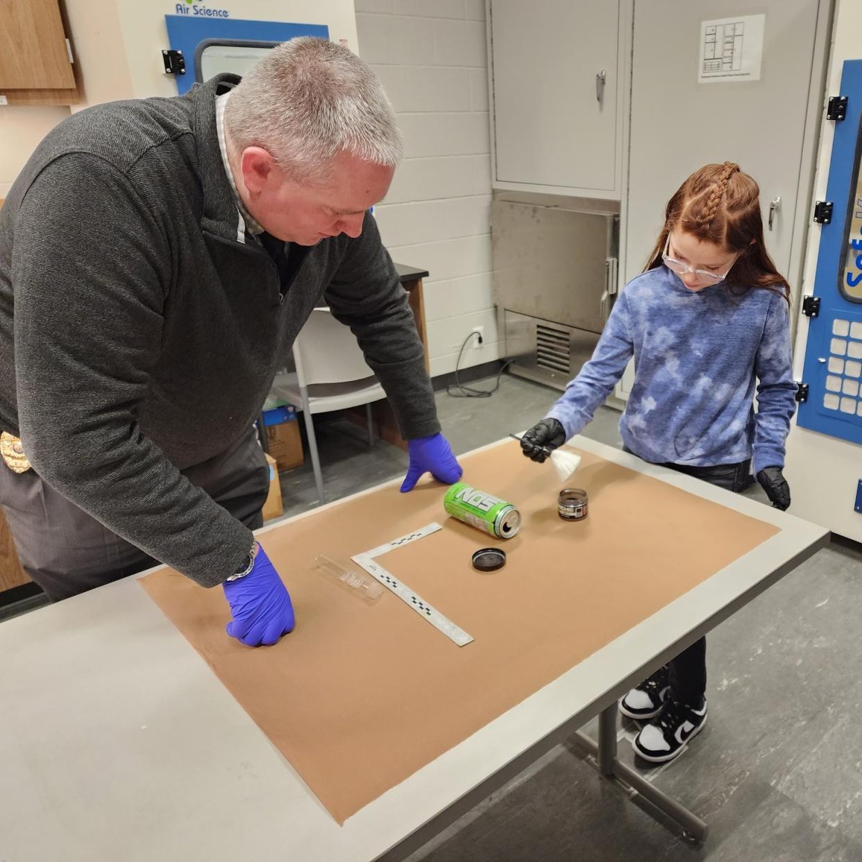 Scarlett Doumato does a fingerprint exercise (Cumberland Police Department )