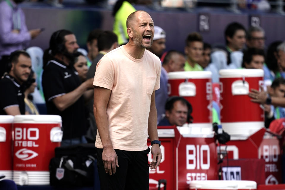 USA head coach Gregg Berhalter watches during the first half of an international friendly soccer match against Uruguay Sunday, June 5, 2022, in Kansas City, Kan. (AP Photo/Charlie Riedel)