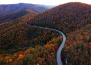 While New England’s trees get most of the attention in the fall, you should be turning south, towards the colors of the Blue Ridge Parkway and Carolina mountains. Make <a href="https://www.cntraveler.com/gallery/best-day-trips-from-charlotte-nc?mbid=synd_yahoo_rss" rel="nofollow noopener" target="_blank" data-ylk="slk:Asheville;elm:context_link;itc:0;sec:content-canvas" class="link ">Asheville</a> your home base for exploring the parkway in both directions: to the south, drive to Pisgah National Forest, filled with waterfalls and fall foliage-covered hills on view from Looking Glass Rock, and to the north, the curving Linn Cove Viaduct hugs Grandfather Mountain, offering some of the parkway’s most iconic views. Shoot for mid-October to see the leaves in full color. In Asheville, make plans to eat—a lot. <a href="https://www.cntraveler.com/restaurants/benne-on-eagle/benne-on-eagle?mbid=synd_yahoo_rss" rel="nofollow noopener" target="_blank" data-ylk="slk:Benne on Eagle;elm:context_link;itc:0;sec:content-canvas" class="link ">Benne on Eagle</a> is serving up its blend of African and Appalachian influences al fresco this fall on its patio, while tapas from <a href="https://www.cntraveler.com/restaurants/curate-asheville/curate-asheville?mbid=synd_yahoo_rss" rel="nofollow noopener" target="_blank" data-ylk="slk:Cúrate;elm:context_link;itc:0;sec:content-canvas" class="link ">Cúrate</a> are now available for delivery. (Even more Spanish snacks and ingredients are available from the restaurant’s bodega.) <em>—Meredith Carey</em>