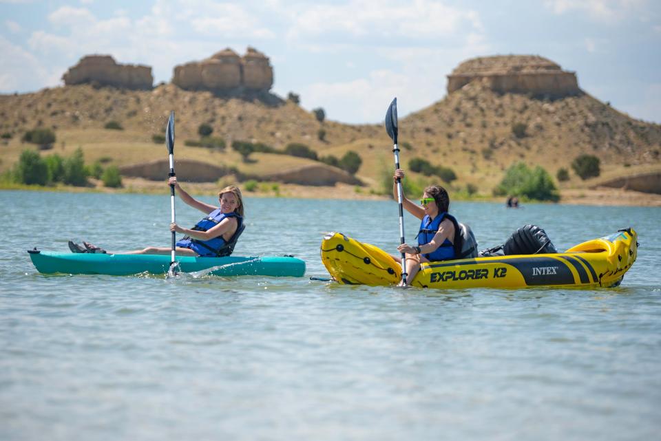 Cadence Kelsch, left, and Cassidy Blechman kayak near the Southshore Marina at Lake Pueblo on Wednesday, July 12, 2023.