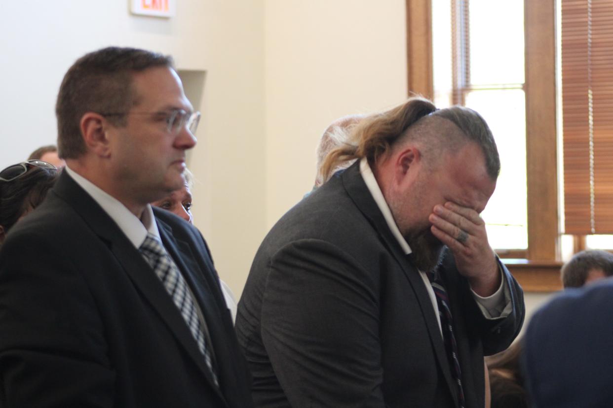 Mike Null broke down in tears as the jury read the not guilty verdict for his brother first on Sept. 15.