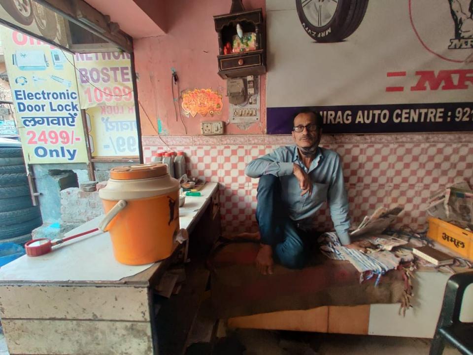 Gulshan Kumar pays Rs 6,000 rent for his one-room tire shop in Budh Vihar.