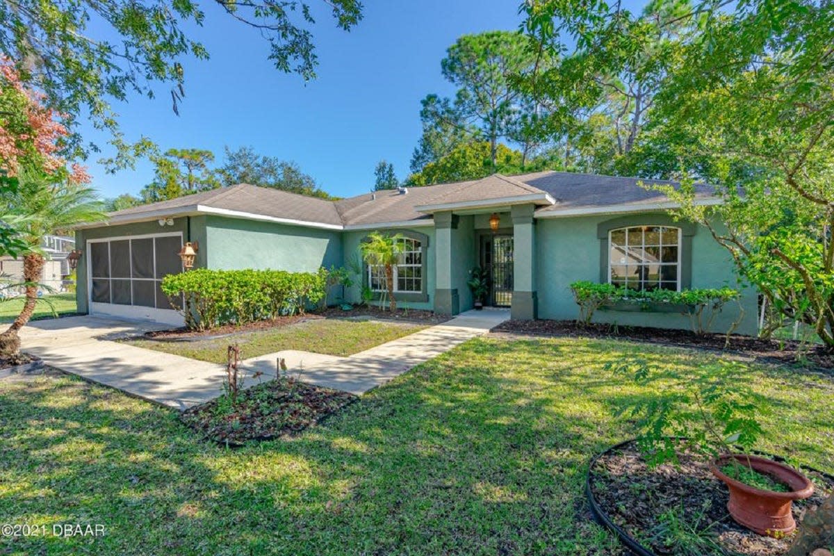 This three-bedroom, two-bath concrete-and-stucco home is in the highly desired Oakland Park neighborhood in Port Orange.