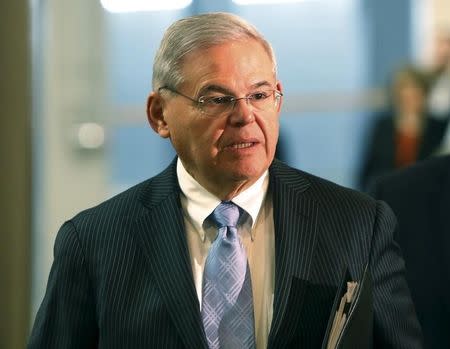 U.S. Senator Robert Menendez (D-NJ)walks to closed door briefings with fellow Senators and Secretary of State John Kerry (not pictured) on nuclear negotiations with Iran on Capitol Hill in Washington April 14, 2015. REUTERS/Gary Cameron