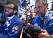 Traders work on the floor of the New York Stock Exchange August 25, 2015. REUTERS/Brendan McDermid