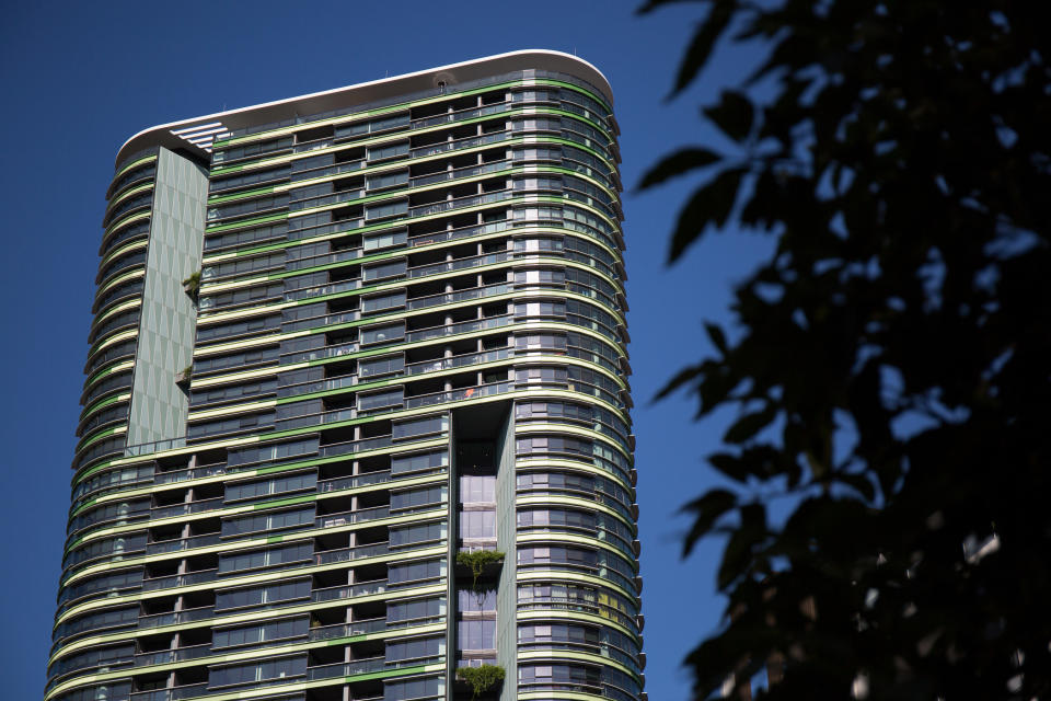 The Opal Tower building is seen at Sydney's Olympic Park, Thursday, May 23, 2019. The newly built block in Sydney Olympic Park was evacuated on Christmas Eve after cracks were found in the building, sparking fears it could collapse. (AAP Image/Paul Braven)