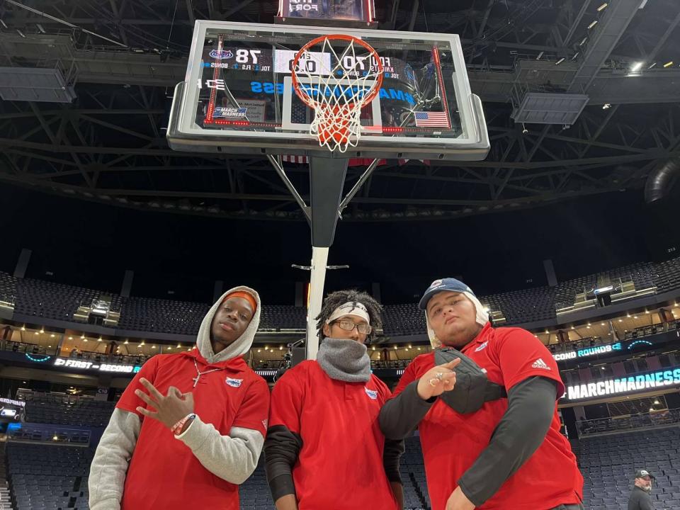 Florida Atlantic University band members (from left) Jeff Debrine, Nathan Clarke and Franklin Ticas Castellon in Columbus, Ohio, after FAU's victory over Fairleigh Dickinson put the Owls into the Sweet 16.