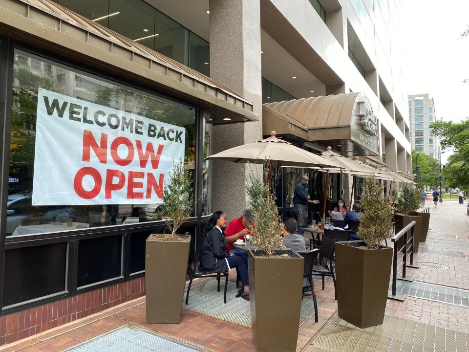 People eat at a restaurant on June 17, 2020, in Washington, DC.(Daniel Slim/AFP via Getty Images)