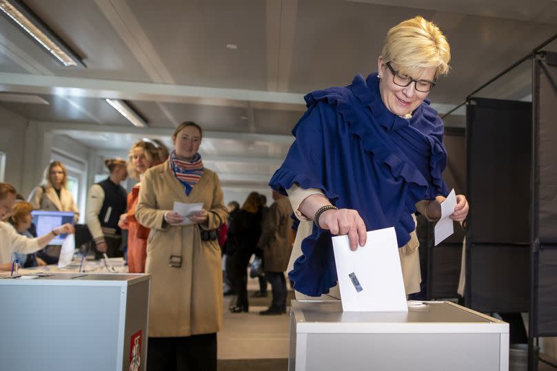 Lithuania's Prime Minister Ingrida Simonyte, a presidential candidate, casts her vote at a polling station during the advance presidential elections in Vilnius