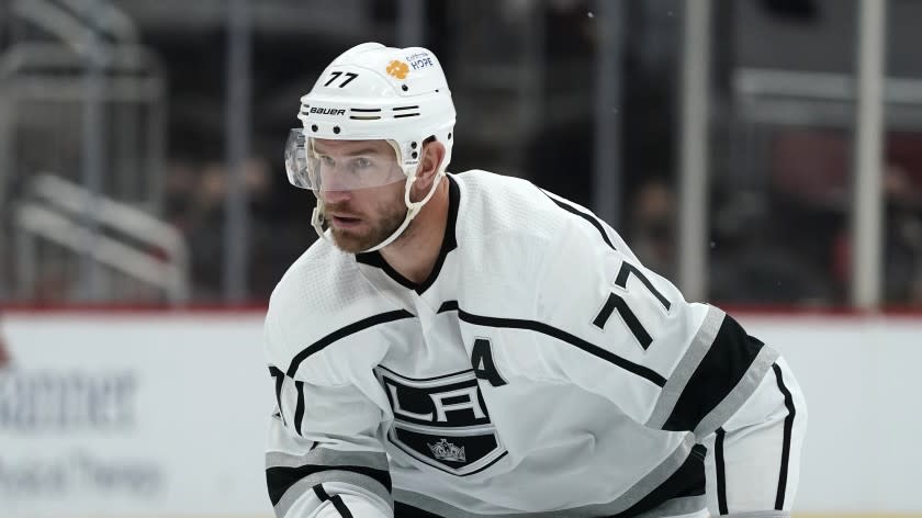 Los Angeles Kings center Jeff Carter skates to the puck during the third period of an NHL hockey game.