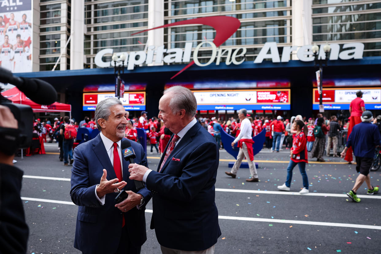 Wizards and Capitals owner Ted Leonsis (L) speaks to the media outside Capital One Arena. (Scott Taetsch/Getty Images)